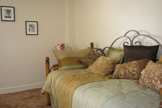 Fairmont Apartments model bedroom with window